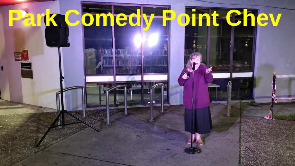 A Comedian  performs outside the Pt Chev Library